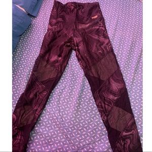 Pink mesh active wear leggings.